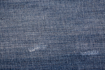 Blue jeans fabric. Denim jeans texture or denim jeans background.