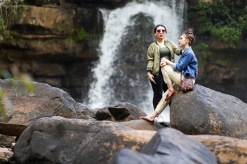 Asian women at the waterfall