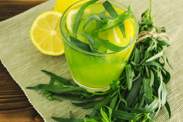 Refreshing sweet lemonade with tarragon. Summer drink.