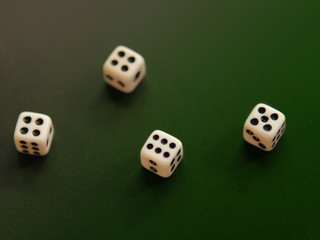 dice with dots on a green background