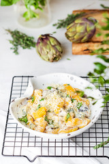 pumpkin gnocchi with mushroom and cream sauce