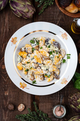 pumpkin gnocchi with mushroom and cream sauce