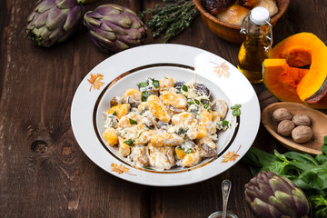 pumpkin gnocchi with mushroom and cream sauce