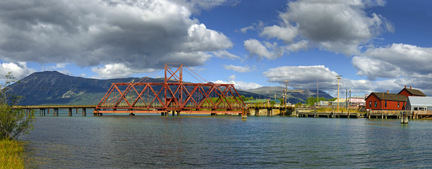 The Iron Rail Bridge of Carcross. Carcross is community in Yukon, Canada, on Bennett Lake and Nares...