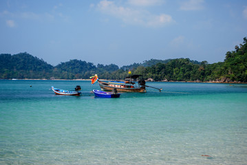 Fototapeta na wymiar Boats on paradise beach, in Koh Panyam, Thailand.