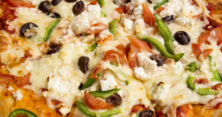 Traditional delicious Italian foods; mixed pizza. Food concept.