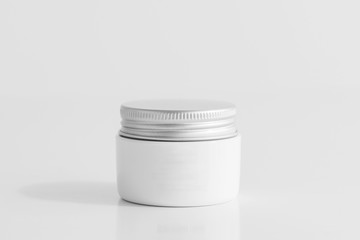 Realistic cosmetic Jar Mock-up on a soft gray background. Cosmetic package for cream, soups, foams. 3D rendering.