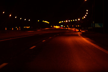 Night traffic lights Blurred defocused background Highway