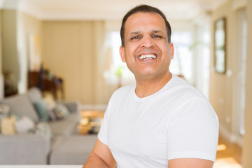 Fototapeta premium Middle age man smiling confident to the camera at home