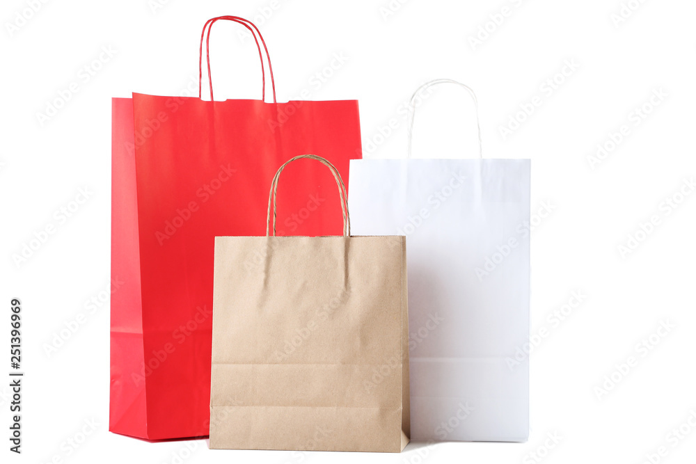 Wall mural Paper shopping bags isolated on white background