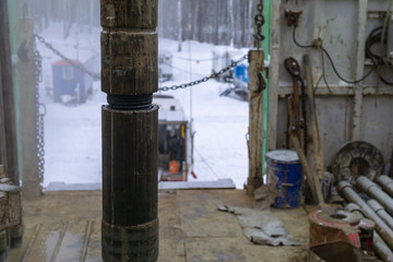Offshore oil rig worker prepare tool and equipment for perforation oil and gas well at wellhead...