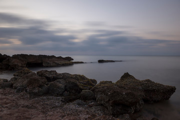 A sunrise by the sea in long exposure