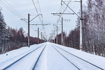 Electric railway lines at winter day time.