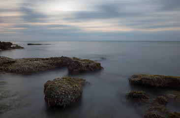 A sunrise by the sea in long exposure