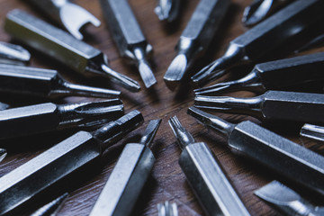 Screwdriver, tool for creating work pieces