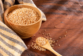 Popped amaranth grain - Amaranthus. Wooden background