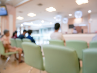 Blur image Background of people in clinic lobby hall at modern hospital to pay money for medical...