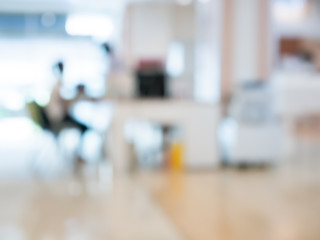 Blur image Background of people in clinic lobby hall at modern hospital to pay money for medical expenses.