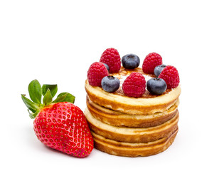 Pile of pancakes with berries