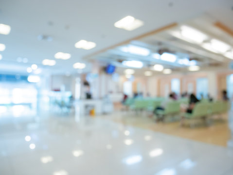 Blur image Background of people in clinic lobby hall at modern hospital to pay money for medical expenses.