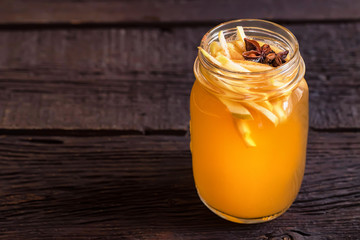 Close up glass jar with delicious healthy apple punch