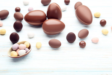 Chocolate easter eggs on wooden table