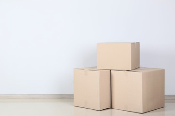 Cardboard boxes on grey background