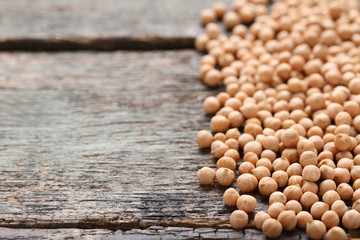 Chickpeas on grey wooden table