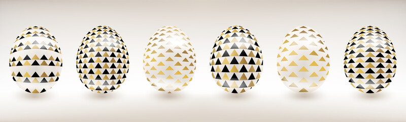 White porcelain Easter egg with gold and black decor