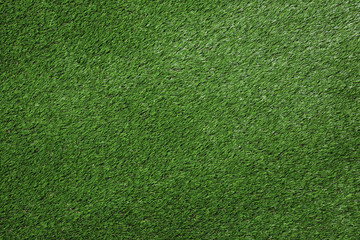 Artificial grass texture as background, top view