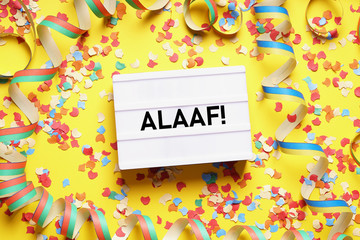 Alaaf is the traditional german fool's call used during carnival in Cologne - flat lay with...