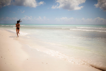 Beach Run. Fitness Woman In Bikini Running In Summer