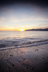 sunset on the beach in almunecar spain