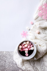 Creative winter natural composition  cup of hot chocolate and marshmallows, with decoration pink color Flat lay Greeting card copy space.Christmas background Festive Drink concept.