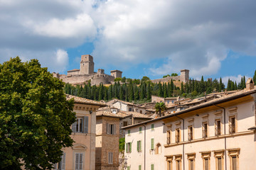 Fototapeta na wymiar Assisi,the town in province of Perugia, Italy, Umbria region.. Scenic view with the Rocca Maggiore, medieval fortress.