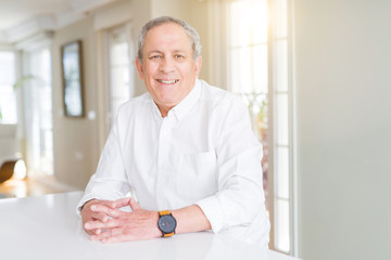 Handsome senior man smiling confident