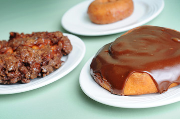 Variety of Breakfast Pastry Food - Donut, Fritter & Cinnamon Bun