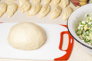 Homemade cake. Ready-made raw patties and dough filling