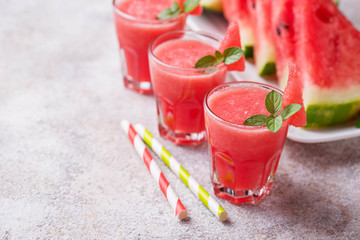 Glasses of watermelon smoothie with mint