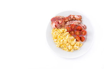 Breakfast with scrambled eggs, bacon and tomatoes isolated on white background. Panoramic view