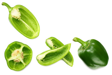 green sweet bell pepper with slices isolated on white background top view