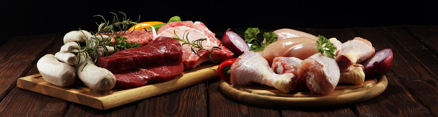 raw meat. Different types of raw pork meat, chicken and beef with spices and herbs