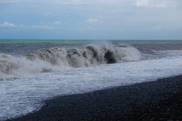 Stormy sea waves breaking near the coast