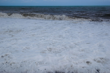 Stormy sea waves breaking near the coast
