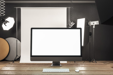 Desktop with blank white computer