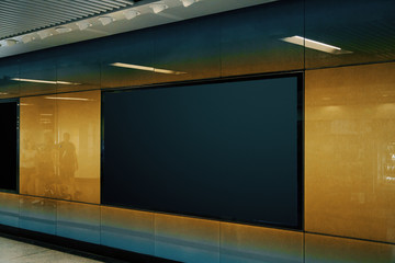 Empty black underground billboard