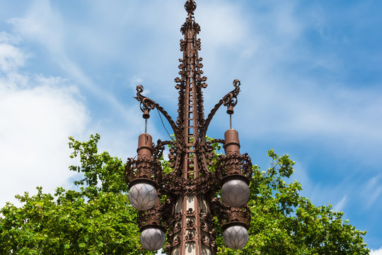 Lampposts in Avinguda de Gaud&iacute; designed by Gaudi in Barcelona, Spain