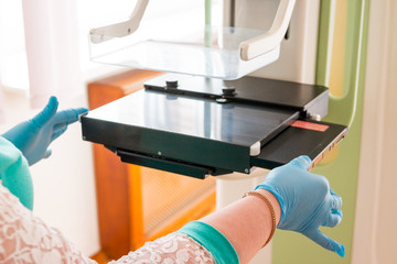 examination of the breast using the mammography x ray machine, which carry out examination of the breast . Prevention of breast cancer.Health care medical technology hi-tech equipment concept. Nurse