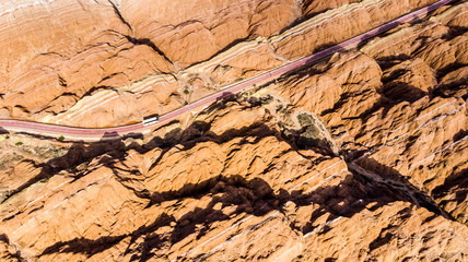 Tourist Buses in Rainbow Mountains Zhangye Danxia Landform Geological Park in China and Road.