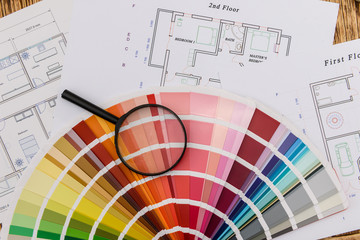 House project with colour swatch and magnifying glass